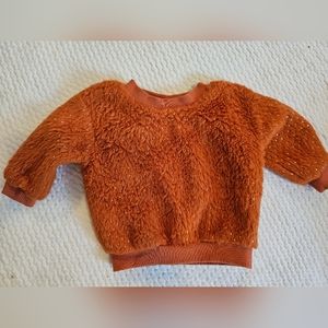 Just Izzy baby girl orange with gold flecks sweatshirt 6-9mos